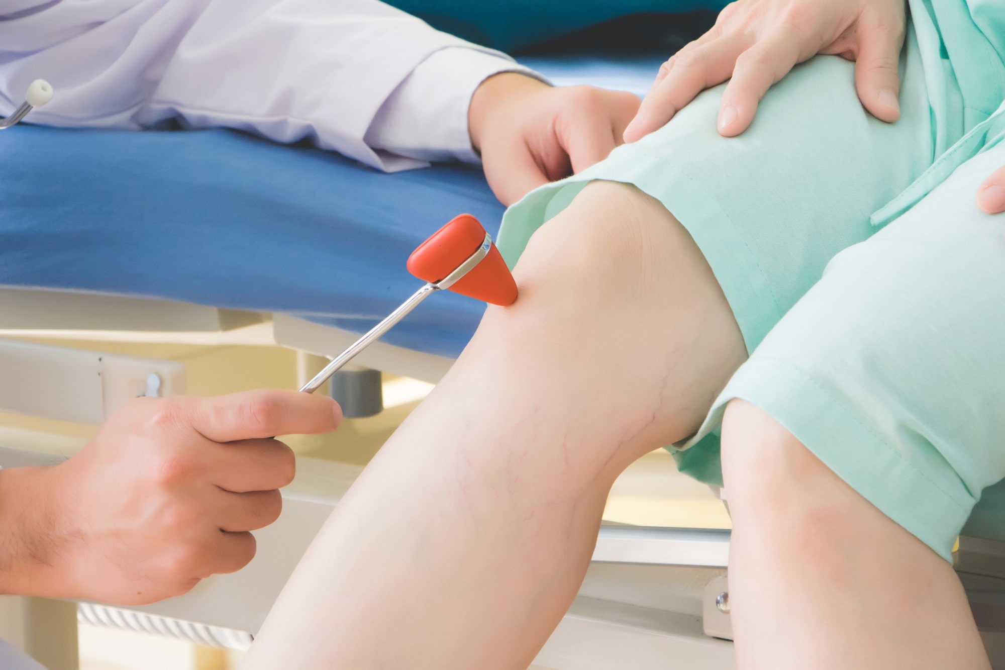 doctor-is-using-hammer-knock-elderly-patient-test-reaction-which-is-controlled-by-autonomic-nervous-system-min